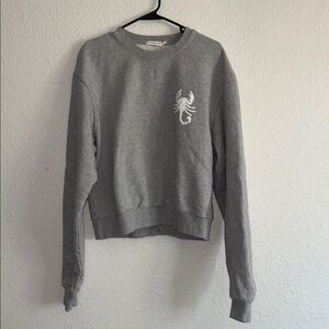 Good American Gray Crewneck Sweatshirt with White Scorpion Graphic